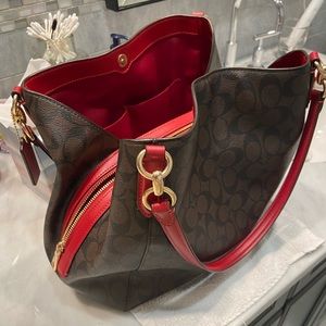 Signature coated canvas with smooth leather details